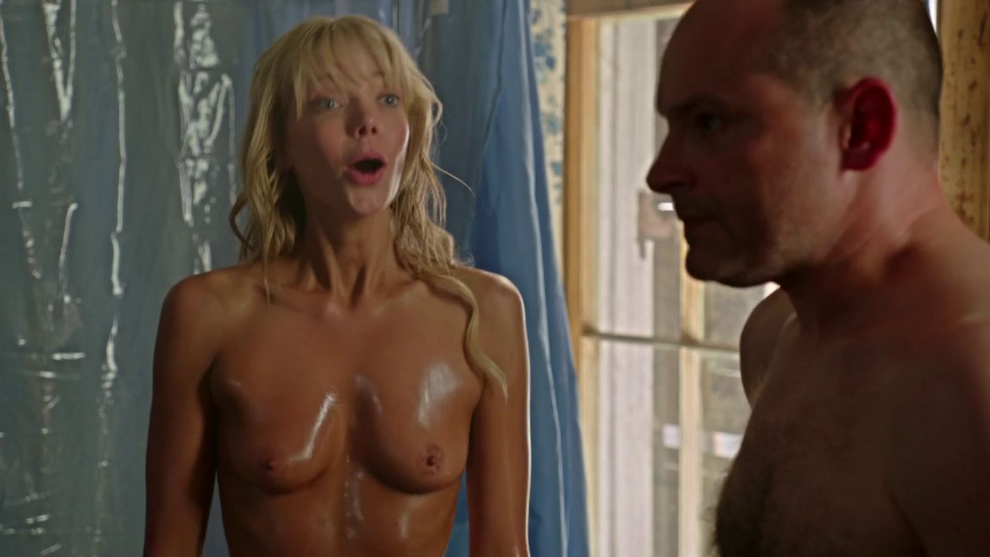 Riki Lindhome in 'Hell Baby' : Oiled and Topless.